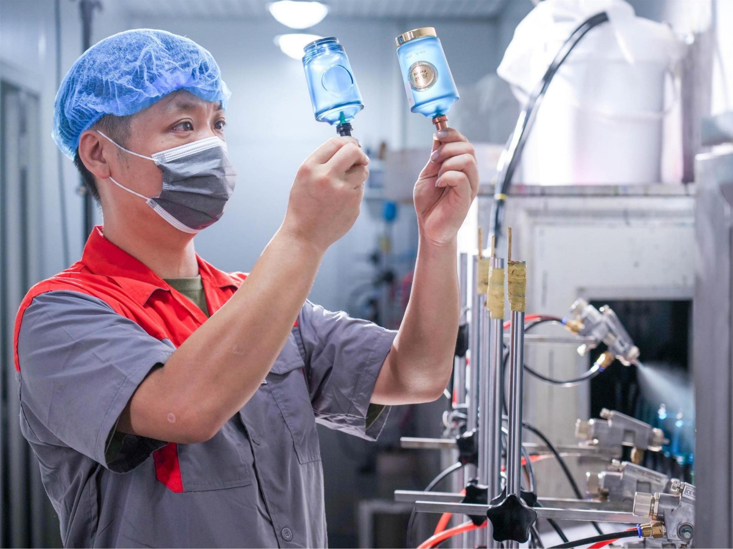 Each perfume bottle is inspected manually