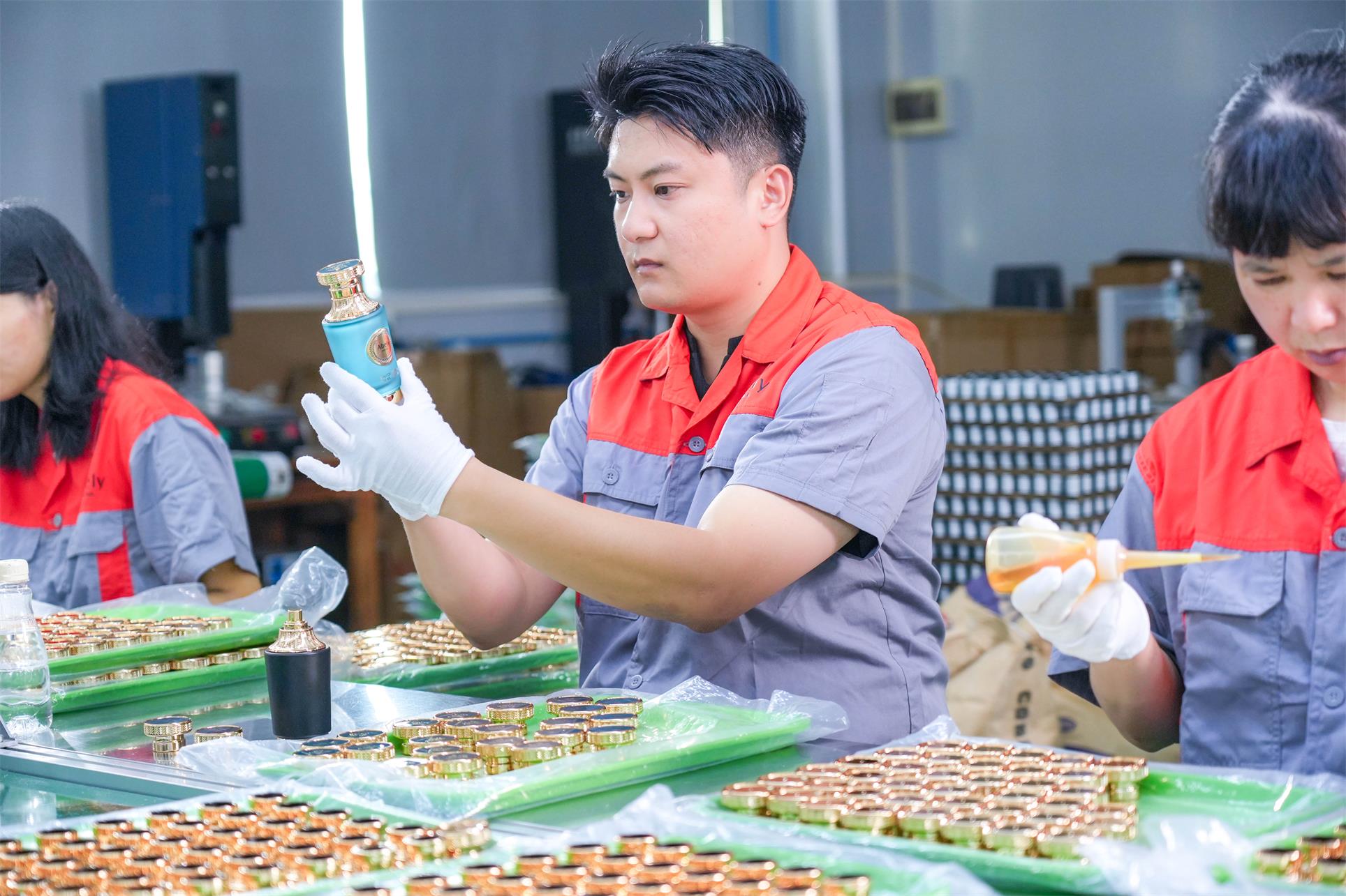 Each fragrance flacon is inspected manually